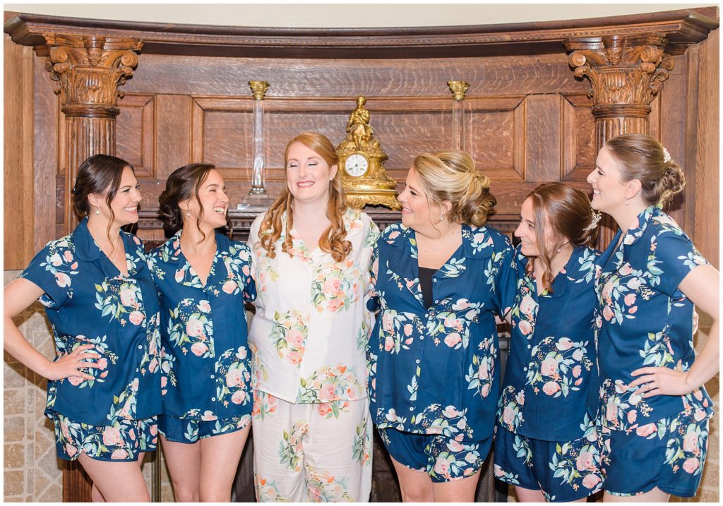 bridesmaids champagne cheers in floral robes