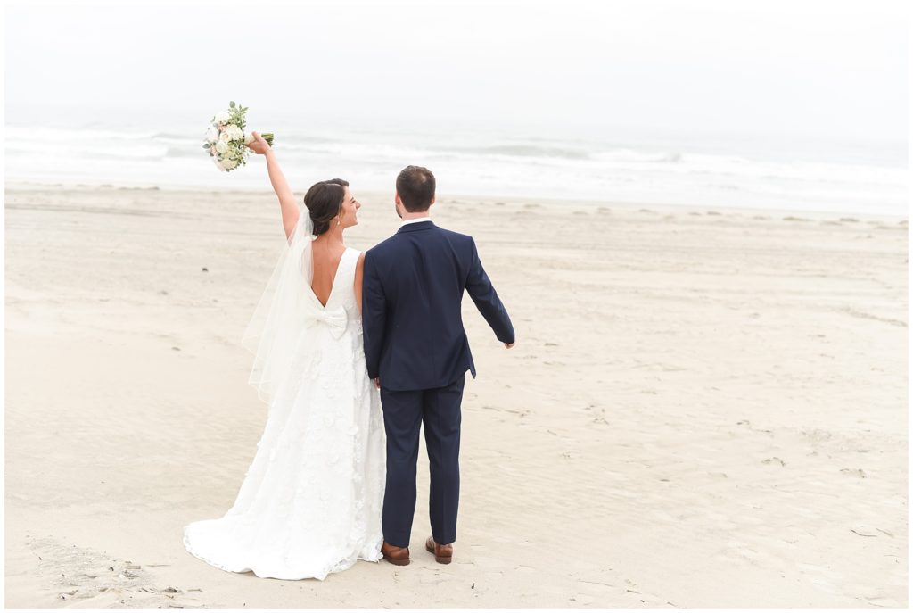 windrift hotel wedding avalon nj bride and groom on beach