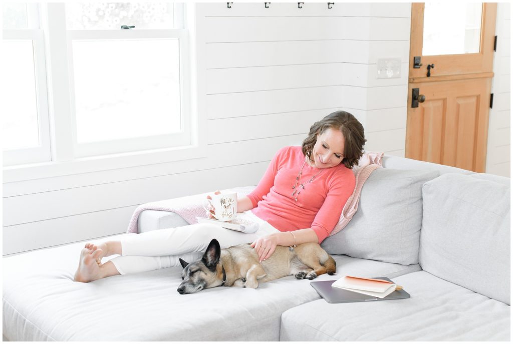 woman relaxing with dog