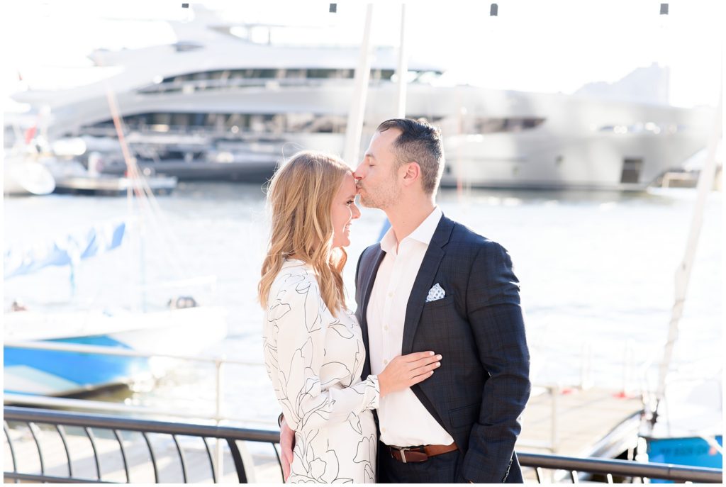 couple at marine in front of boats