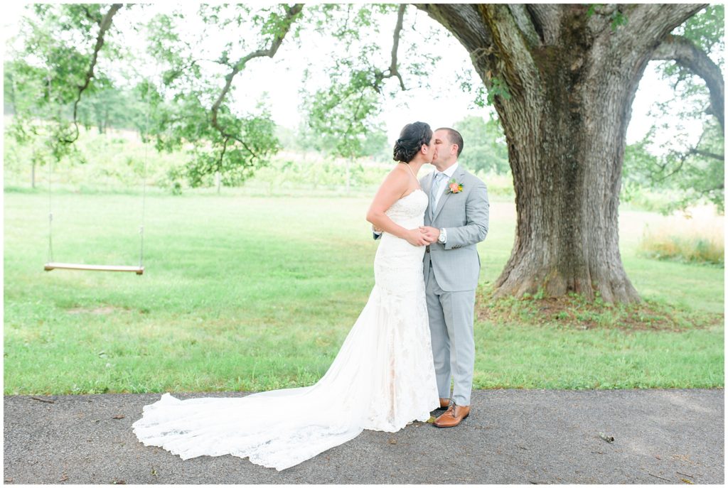 bride and groom first look under maple tree
